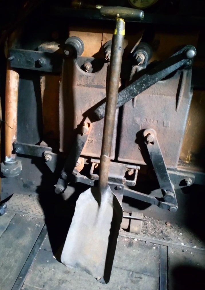 Shovel used by a steam locomotive fireman.