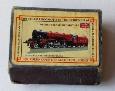 Box of matches with a picture of a steam locomotive on it.